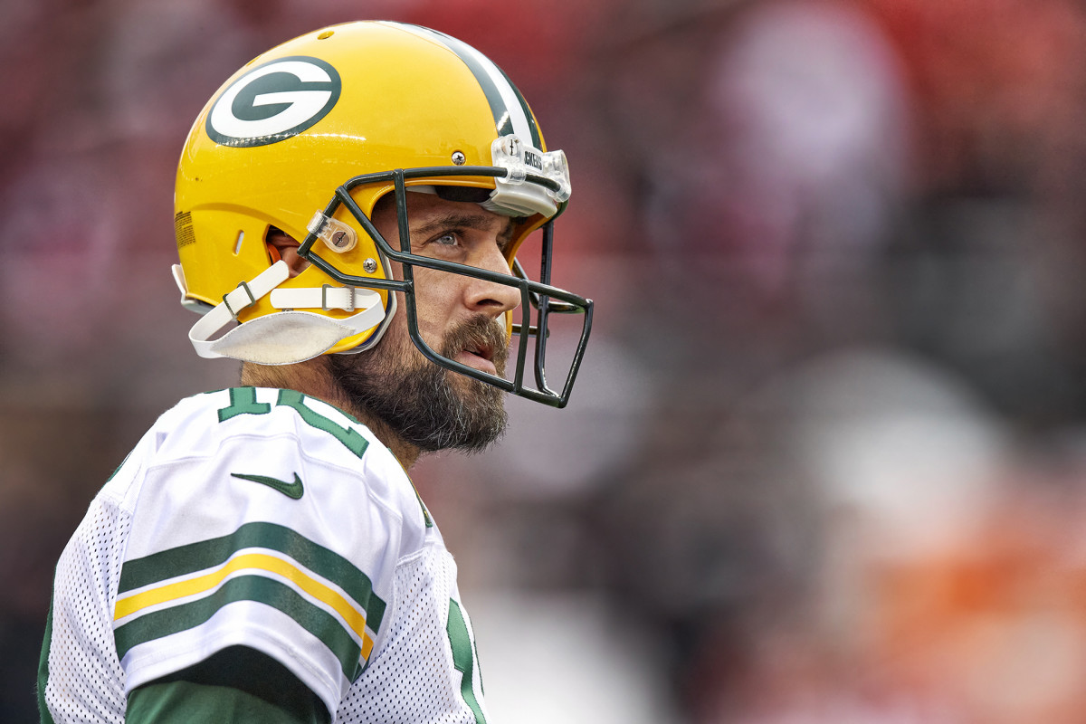 Aaron Rodgers looks to the stands during a break in the action of a Packers game.